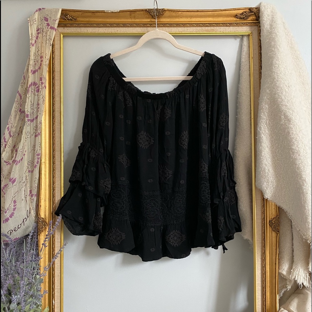 Black ruffled bell sleeved tunic